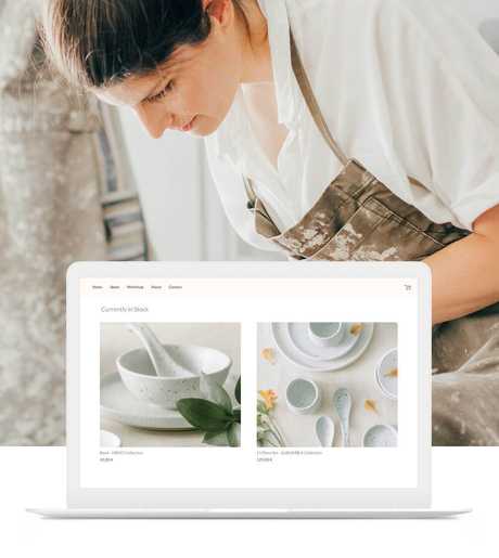 A female potter in overalls forming clay pottery to sell on her online store.